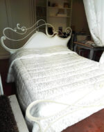 Letto in ferro battuto con imbottitura