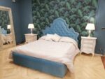 Letto imbottito bottonato