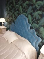 Letto imbottito bottonato